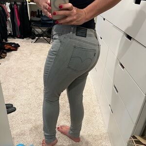 Levi’s 311 skinny stretchy grey jeans.